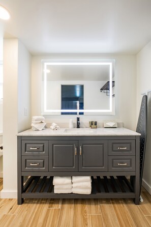 Double Queen Beds - Pool View | Bathroom | Shower, hair dryer, towels, soap