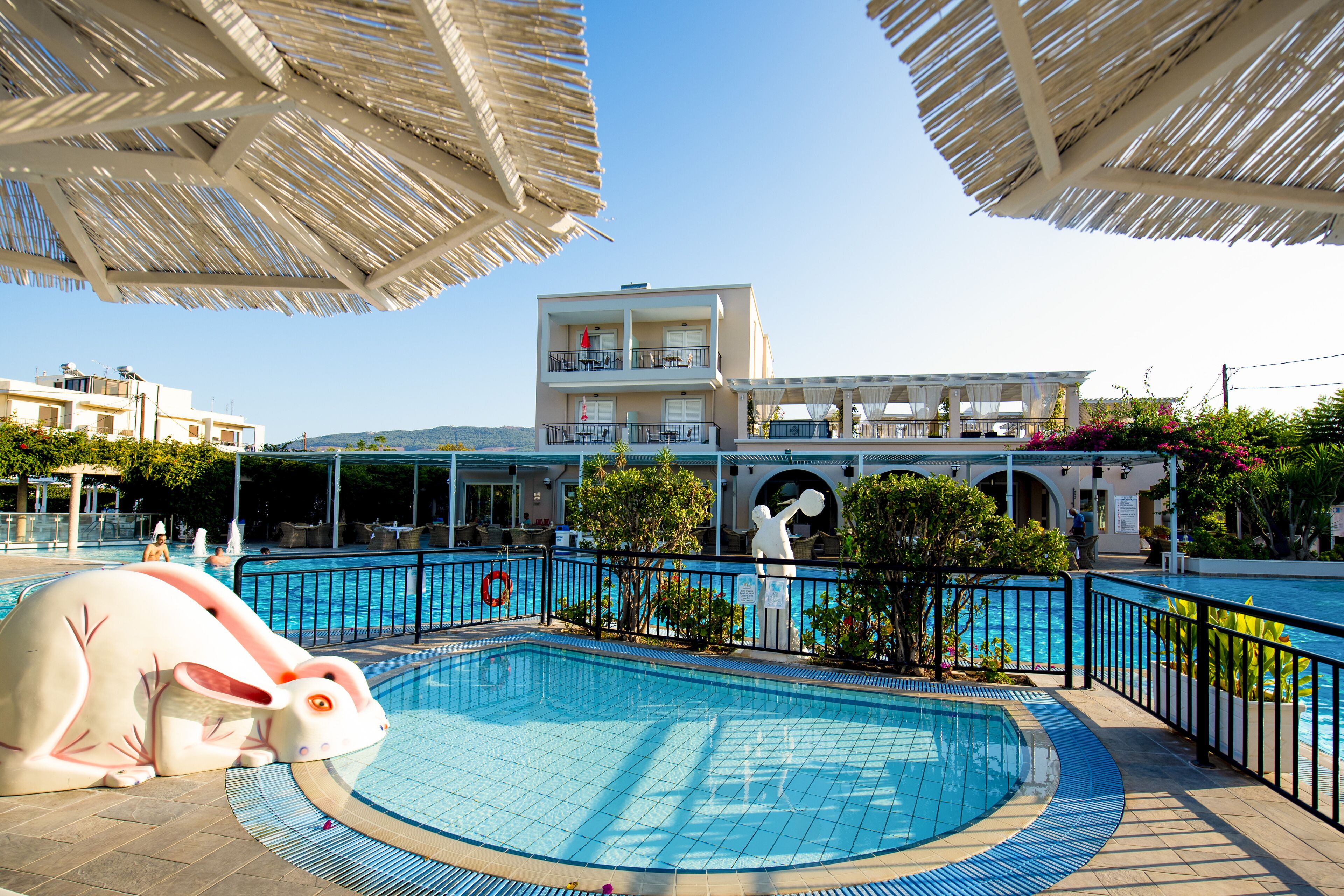 3 outdoor pools, pool umbrellas, lifeguards on site