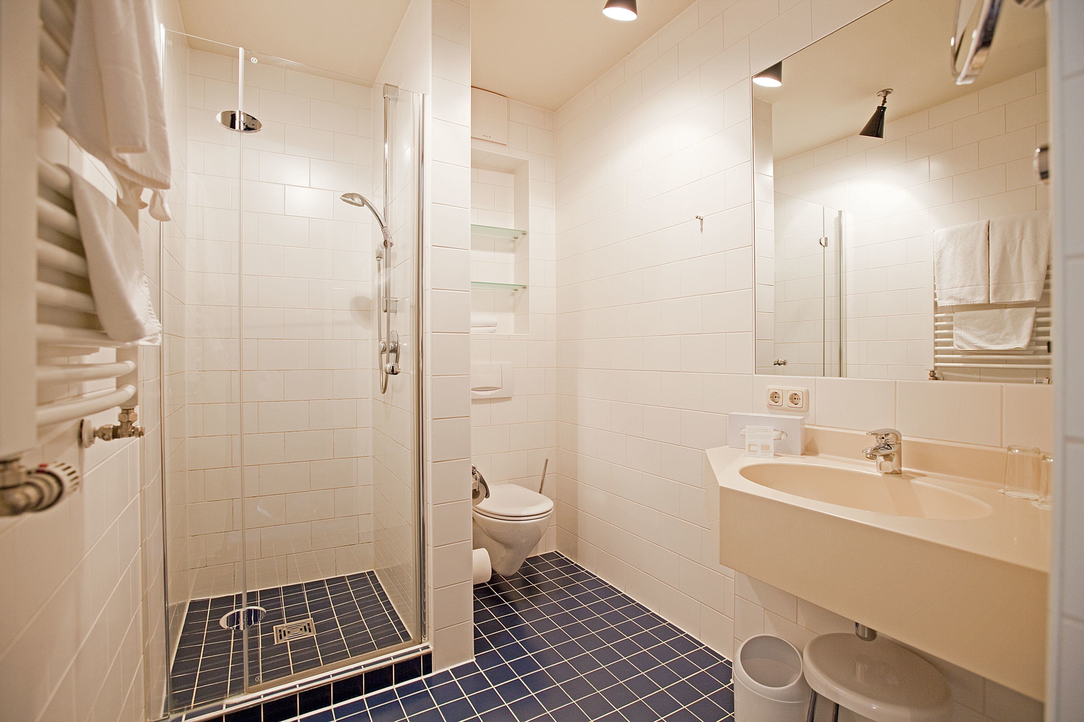 standard room | bathroom | shower, free toiletries, hair dryer, slippers