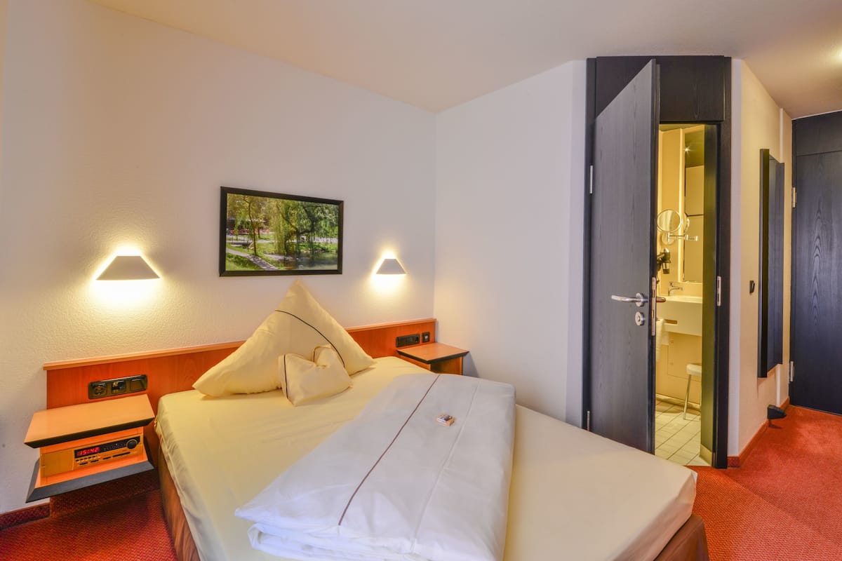 Quarto standard | Roupas de cama antialérgicas, cofres nos quartos, escrivaninha