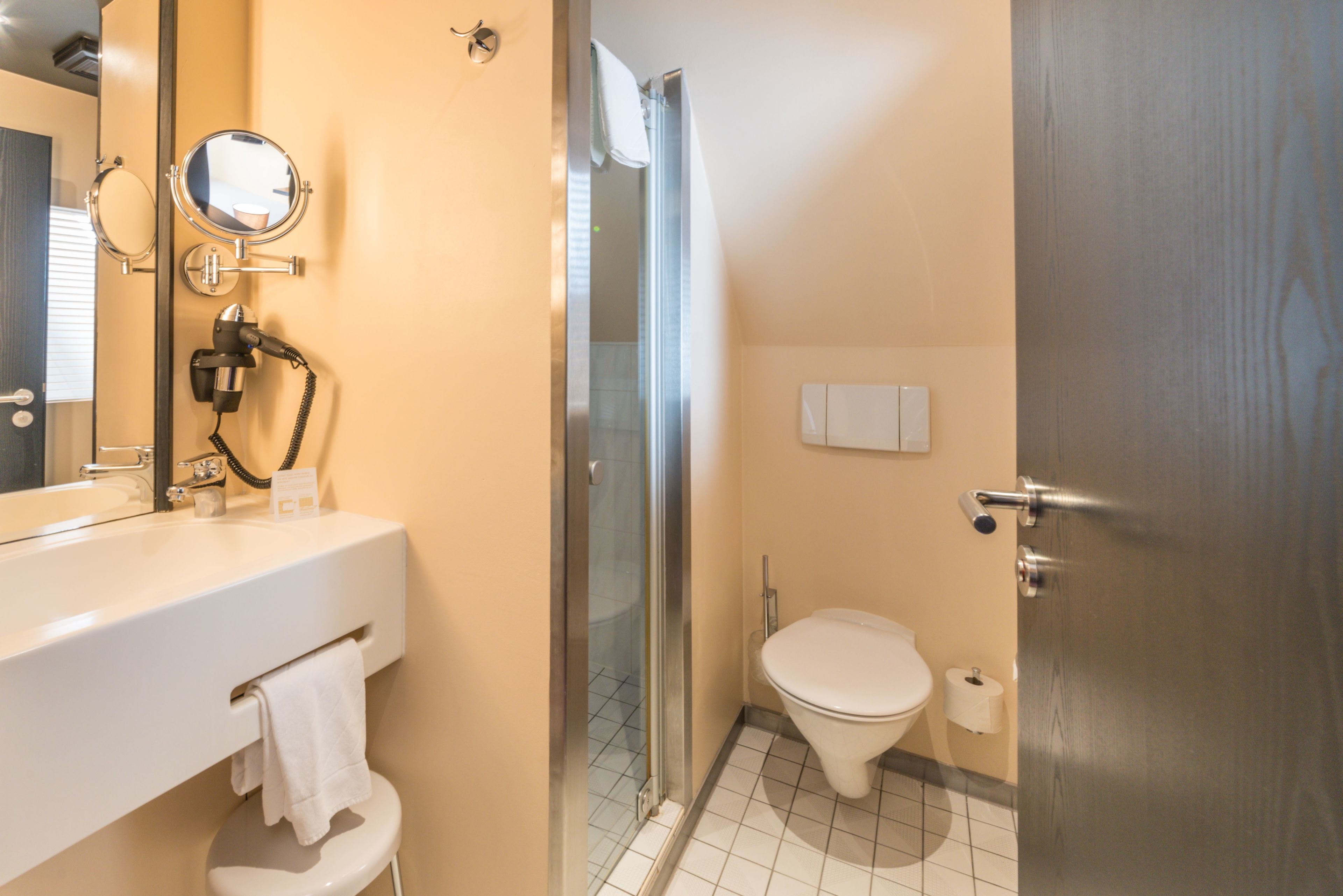 standard room | bathroom | shower, free toiletries, hair dryer, slippers
