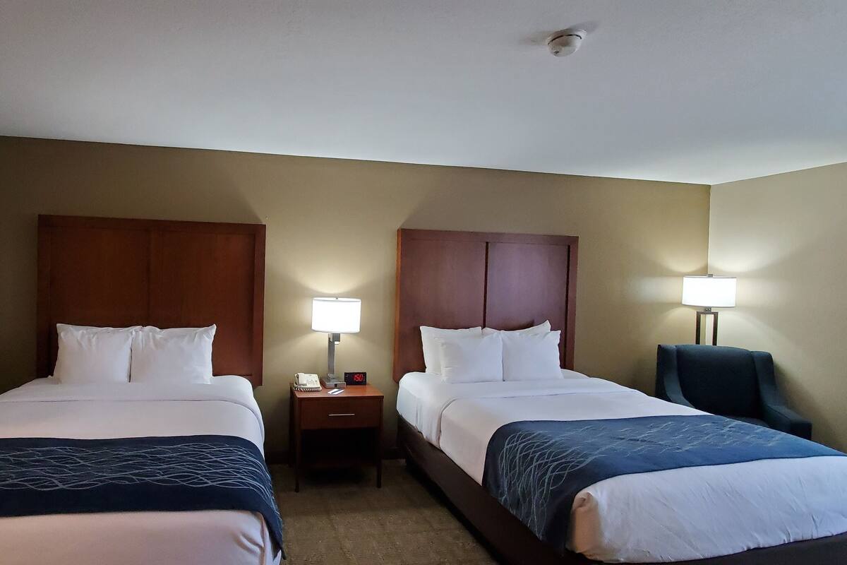 Standard Room, 2 Queen Beds, Non Smoking | In-room safe, desk, soundproofing, iron/ironing board