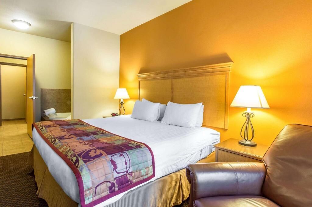 Premium bedding, desk, laptop workspace, blackout curtains