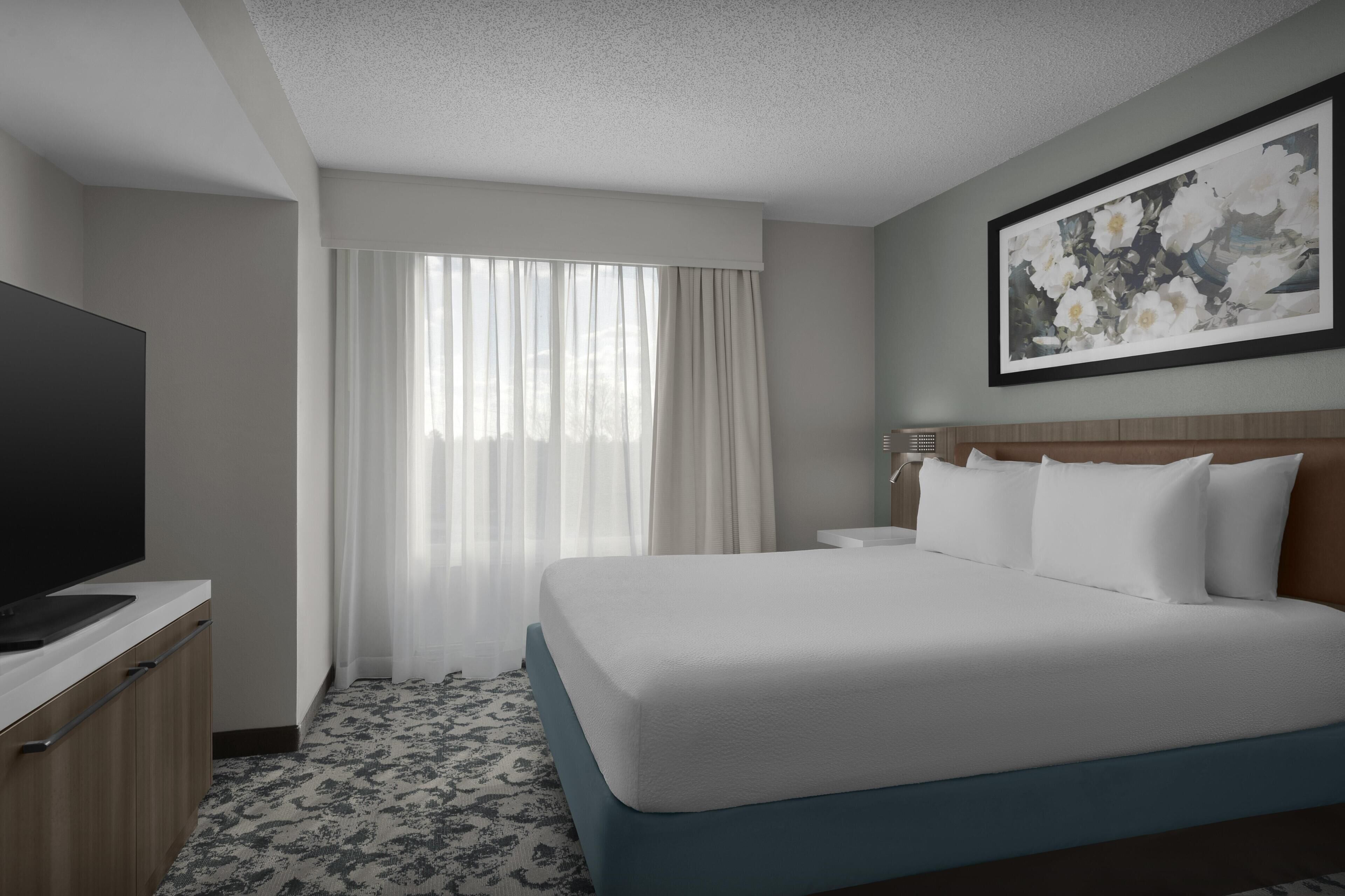 One King Bed Suite | Premium bedding, desk, laptop workspace, blackout curtains