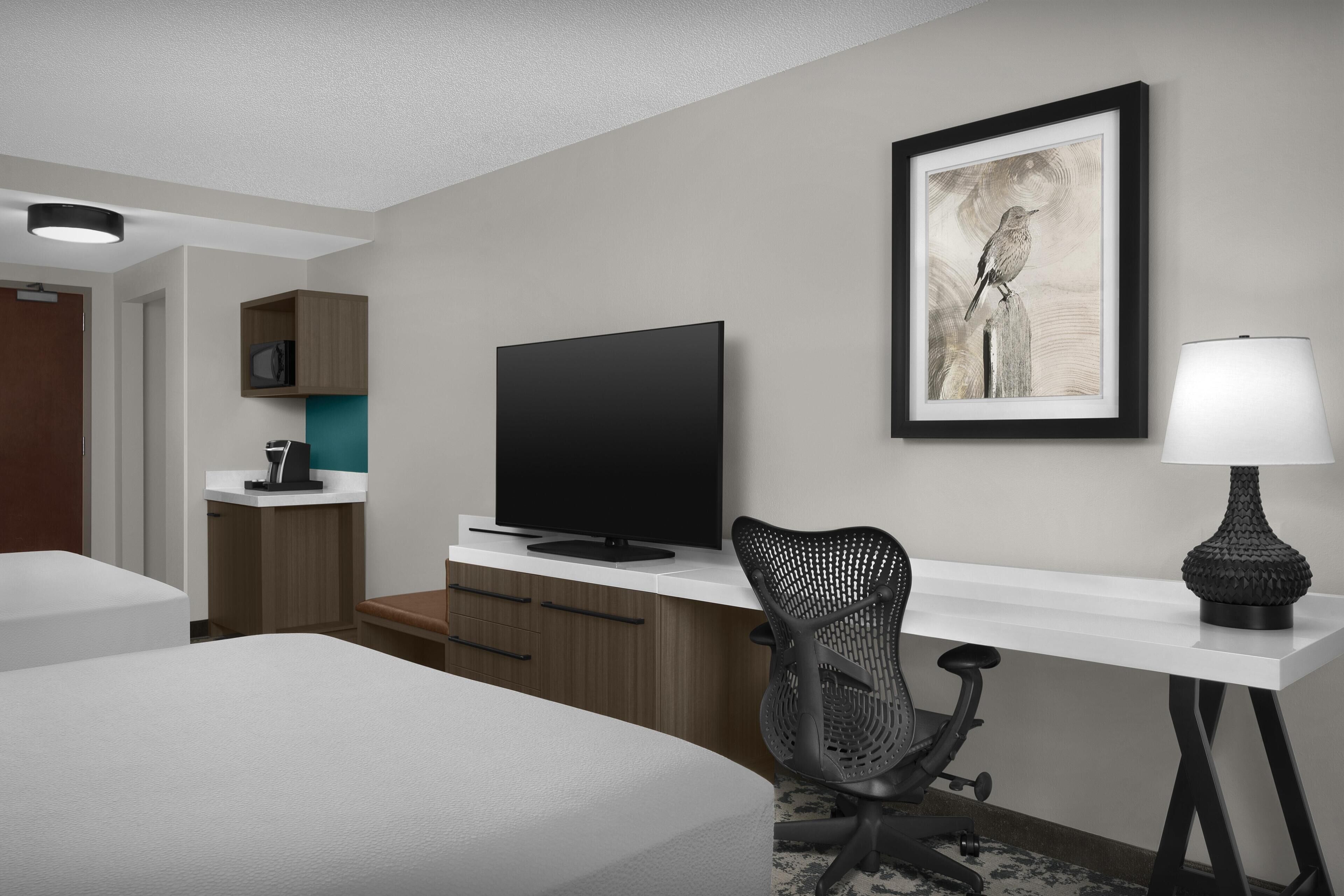 Two queen beds | Premium bedding, desk, laptop workspace, blackout curtains