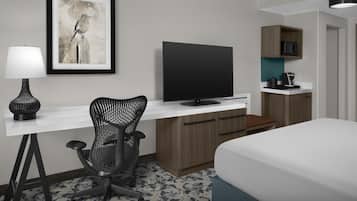 Premium bedding, desk, laptop workspace, blackout curtains
