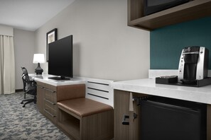 Premium bedding, desk, laptop workspace, blackout curtains