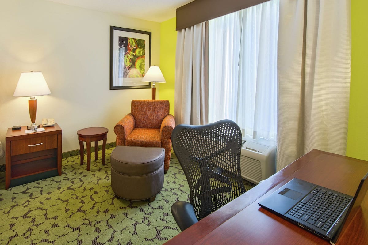 premium bedding, desk, laptop workspace, blackout curtains