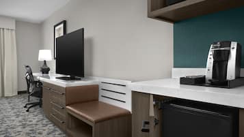 Premium bedding, desk, laptop workspace, blackout curtains