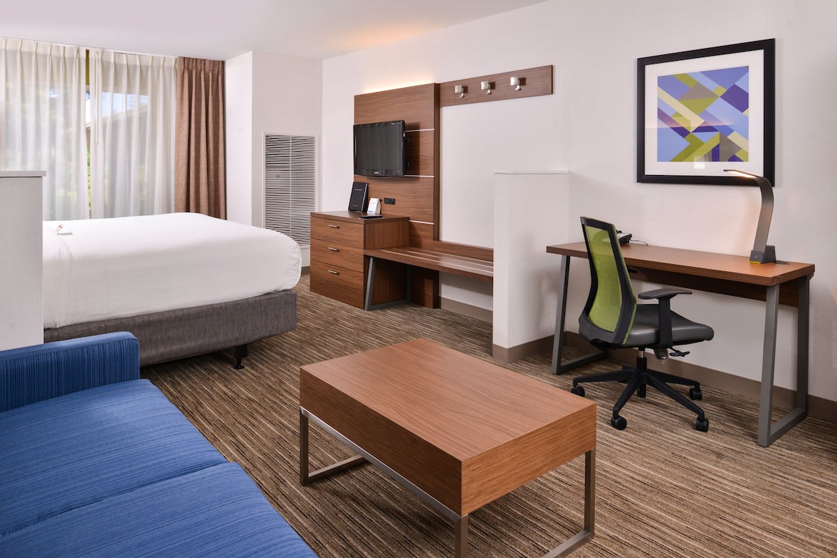 Suite, 1 King Bed with Sofa bed (Living Area) | 1 bedroom, desk, laptop workspace, blackout drapes