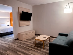 Suite, 1 King Bed, Jetted Tub | In-room safe, desk, iron/ironing board, free cribs/infant beds