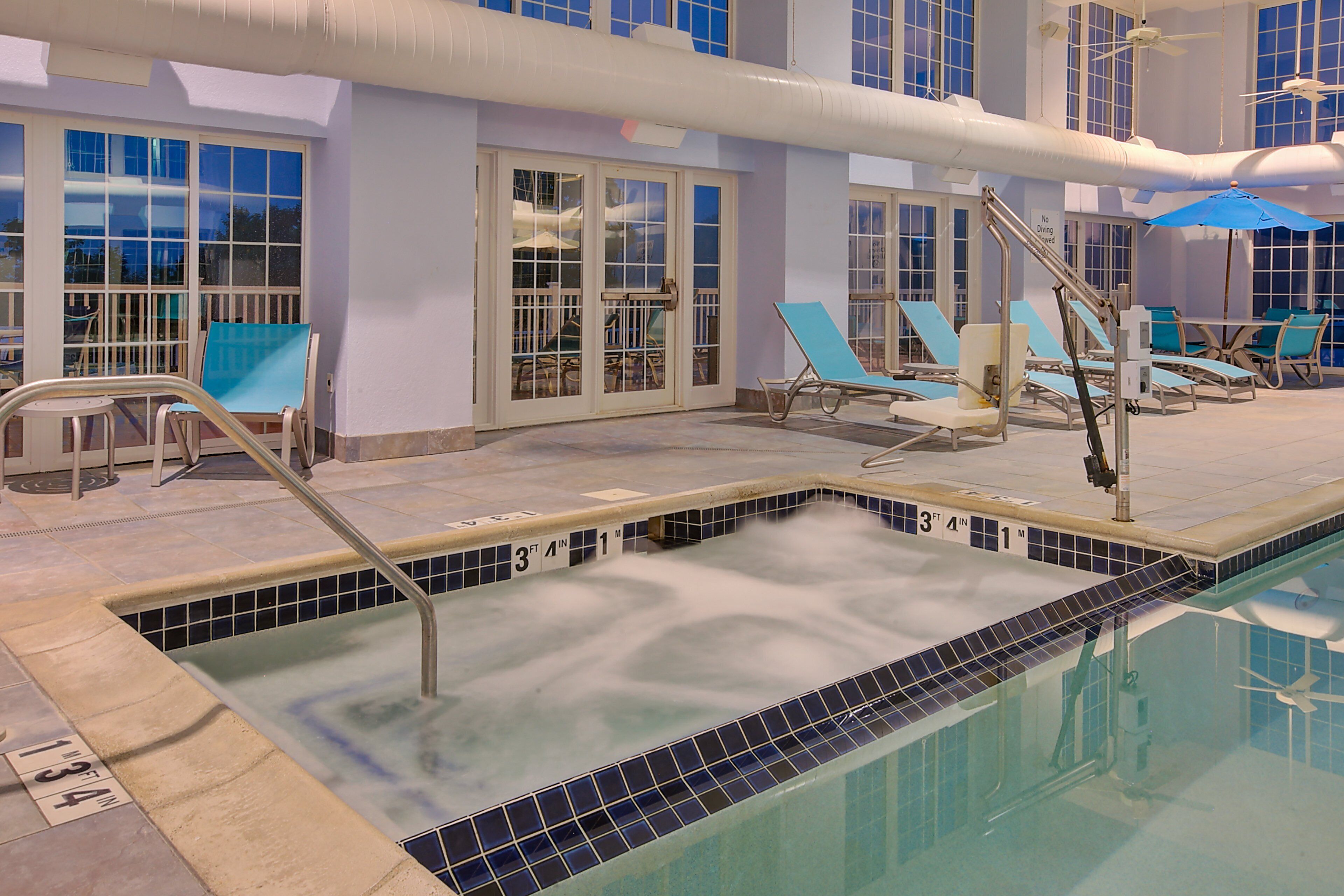 indoor pool, pool loungers