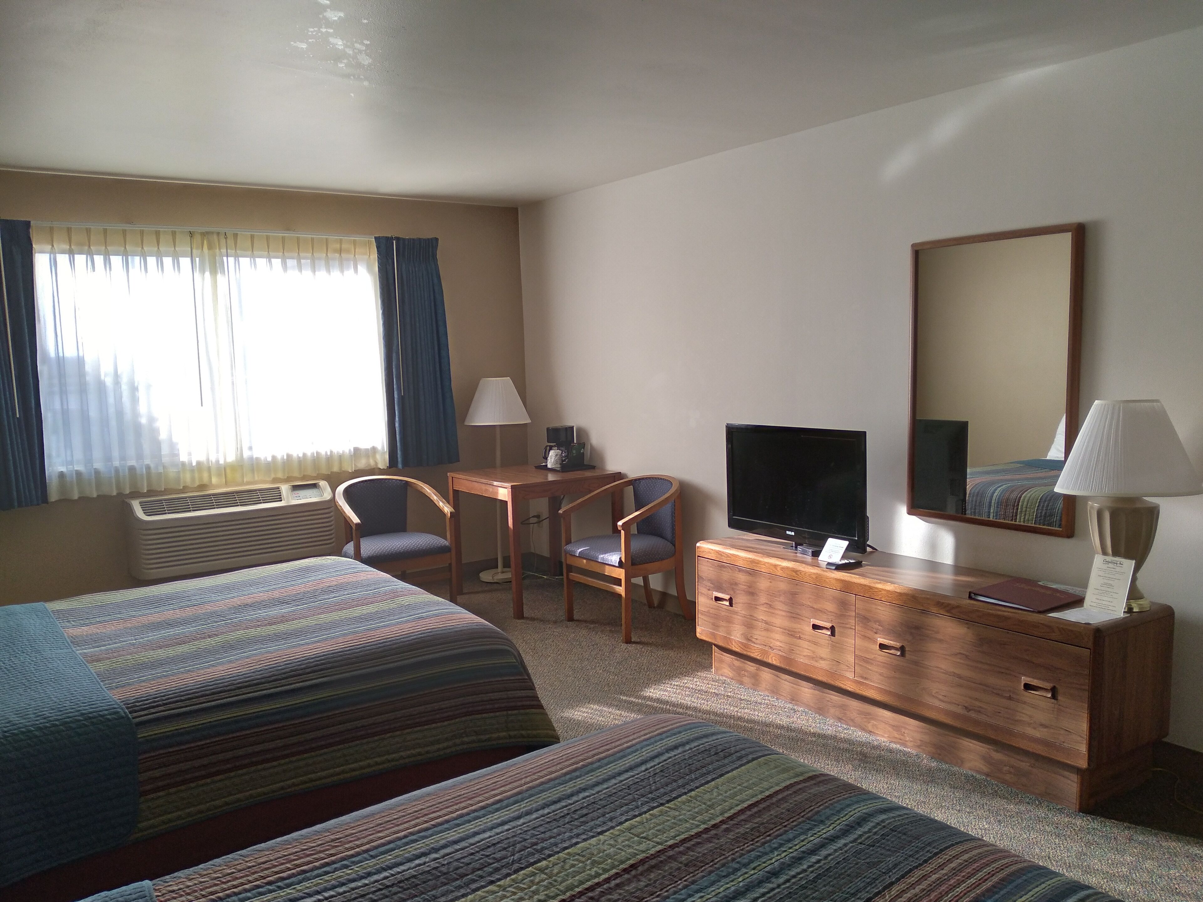room, 2 queen beds | 1 bedroom, blackout curtains, iron/ironing board, free cots/infant beds