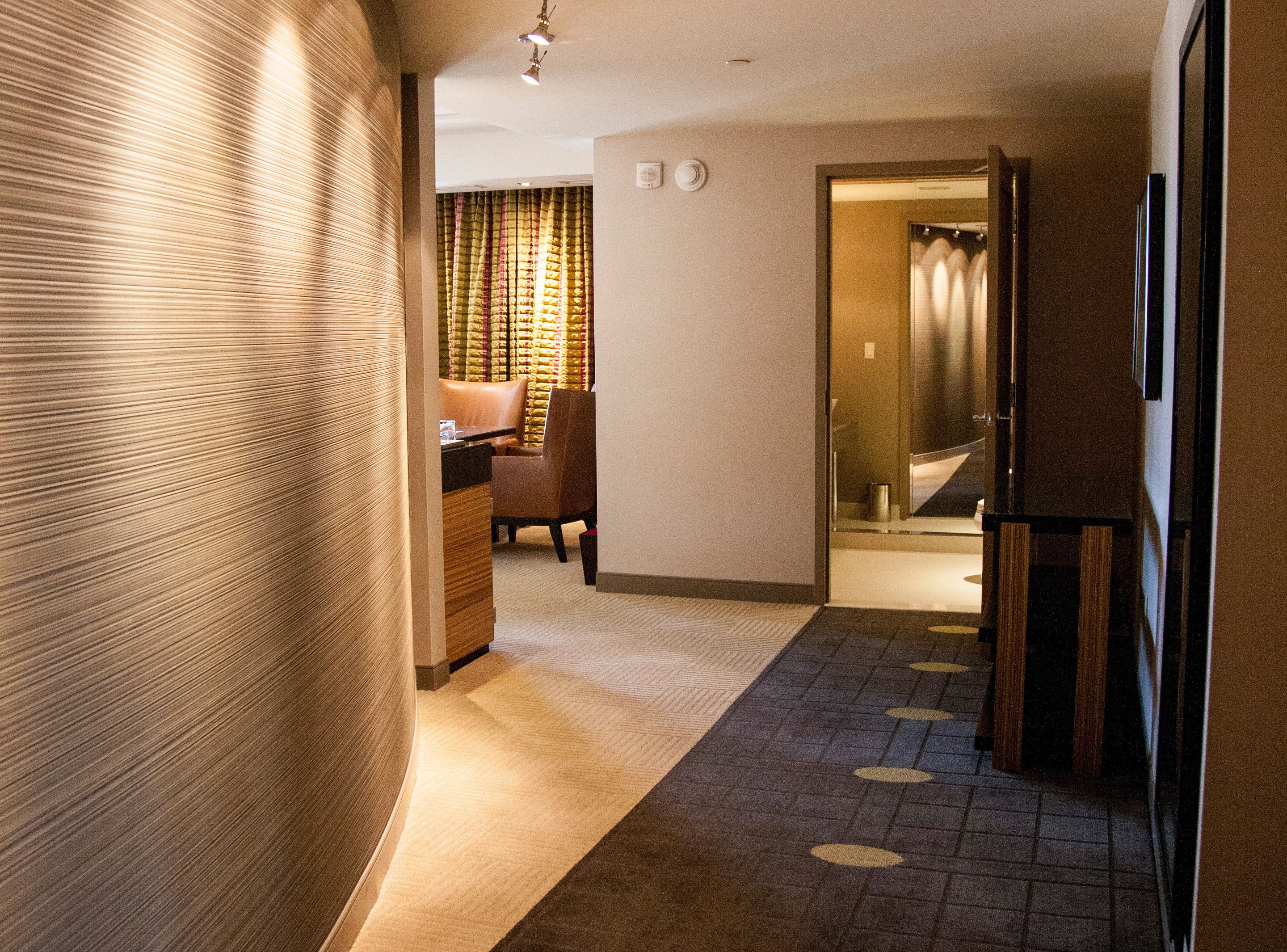 executive suite, 1 king bed, corner | living room | 50-inch plasma tv with cable channels, tv, pay films