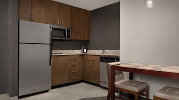 Premium bedding, desk, laptop workspace, blackout drapes