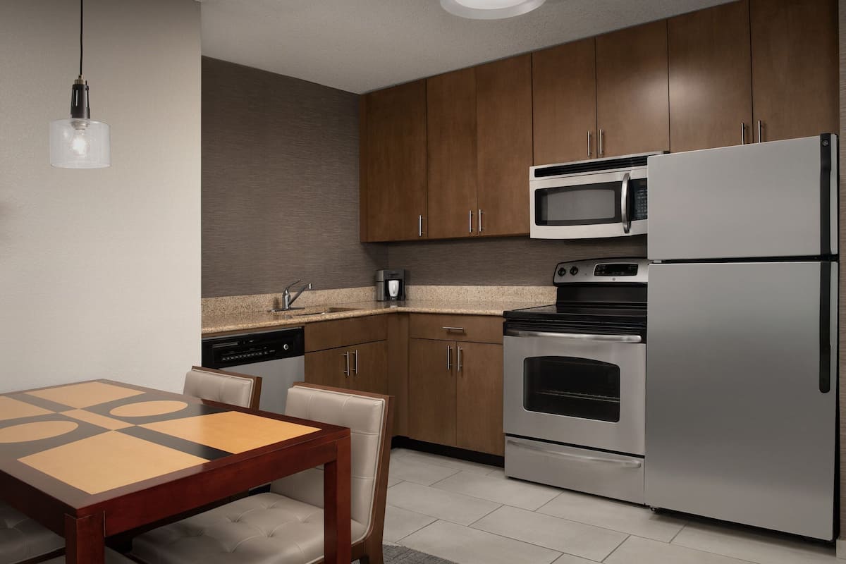 full-sized fridge, microwave, dishwasher, coffee/tea maker