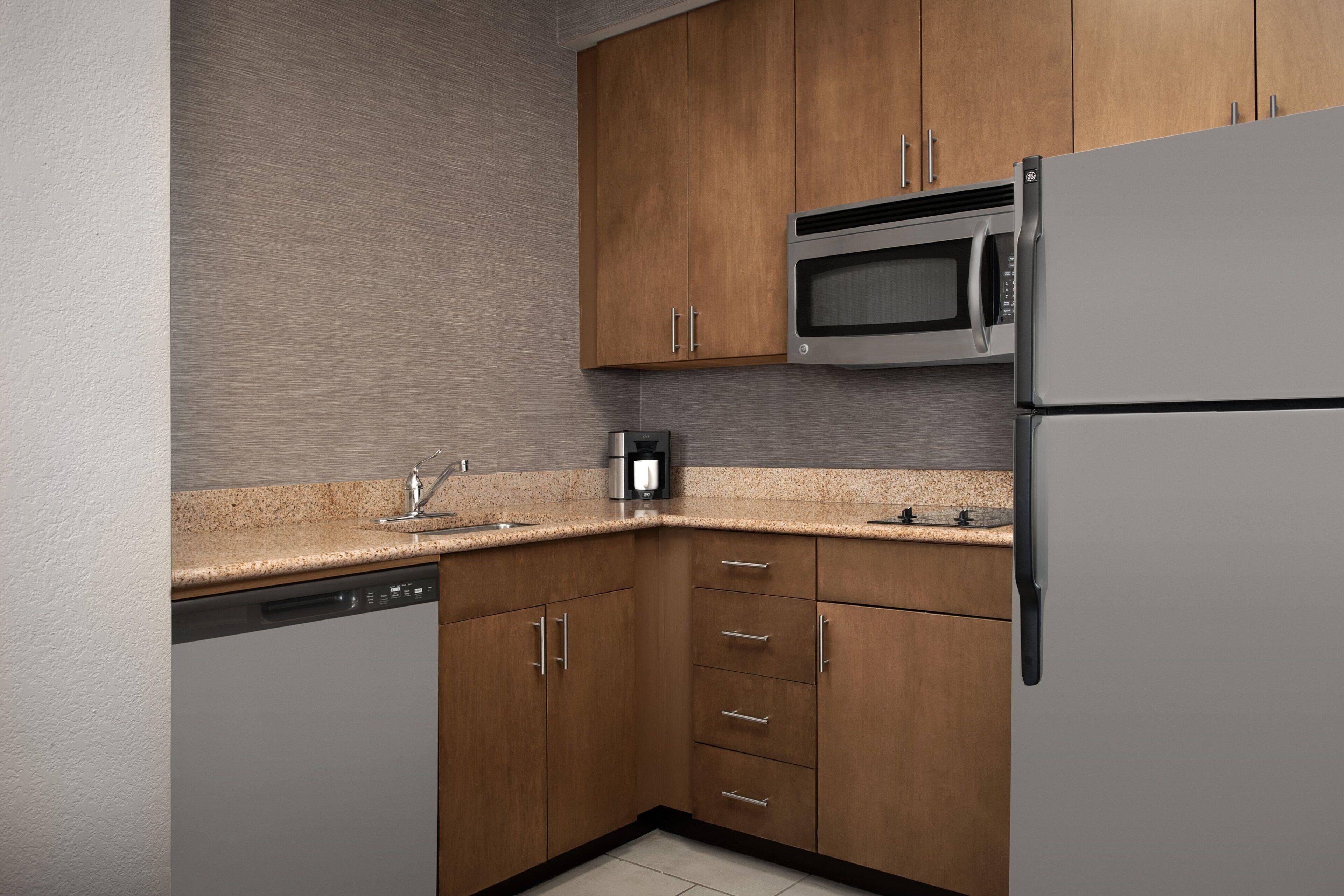 full-sized fridge, microwave, dishwasher, coffee/tea maker