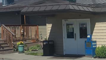 A building with a sign reading "OFFICE" above the entrance.