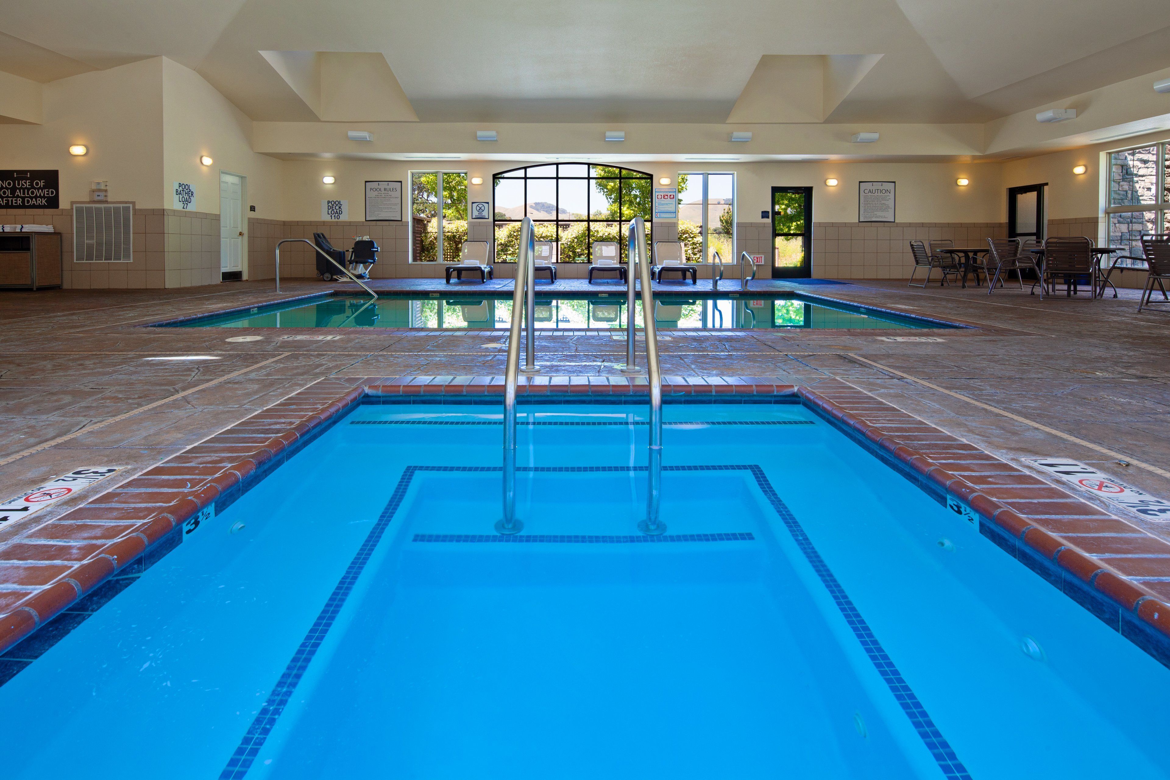 indoor pool, open 8 am to 10 pm, pool loungers
