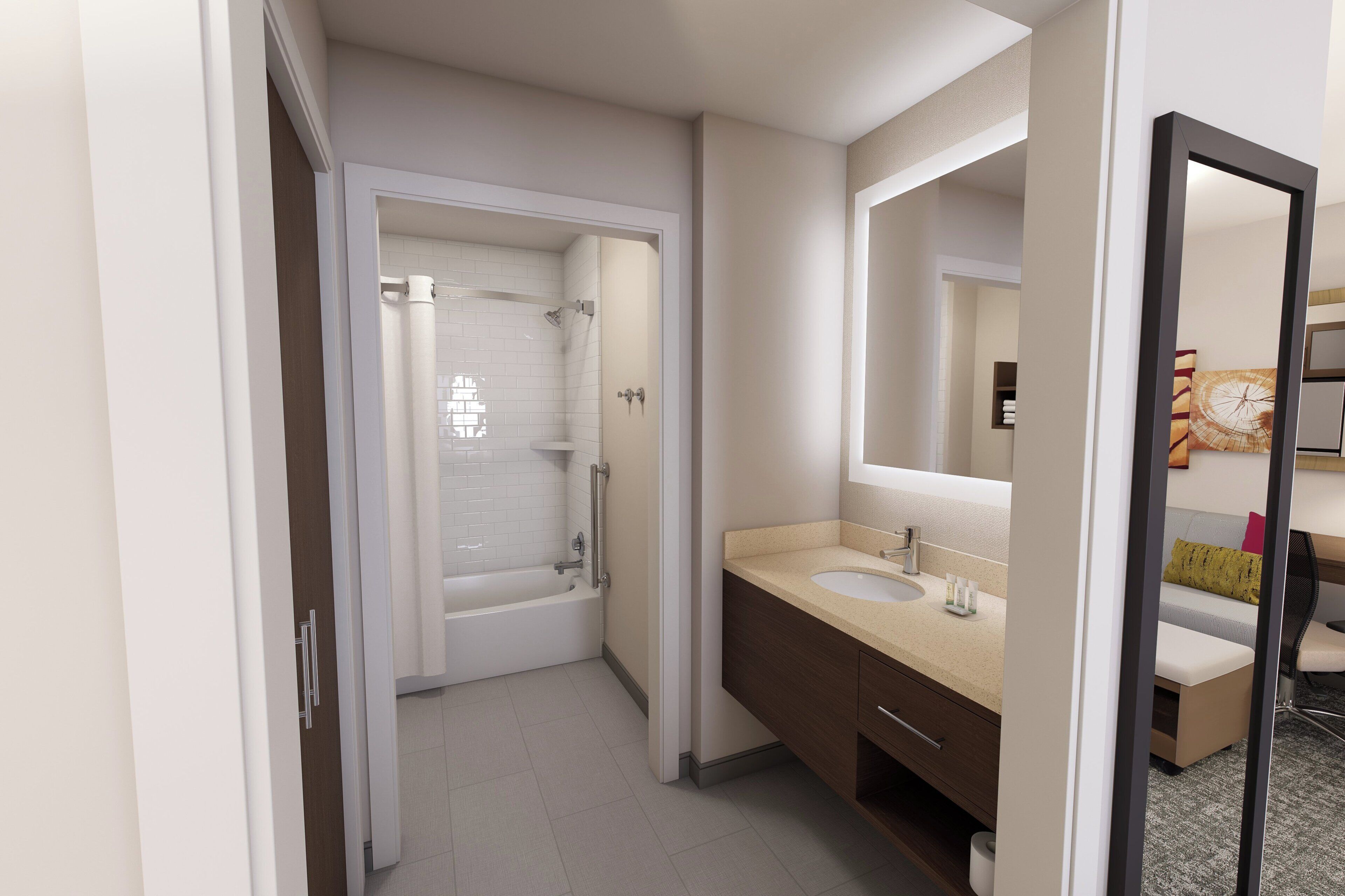 A modern bathroom with a bathtub, a sink, and a mirror.