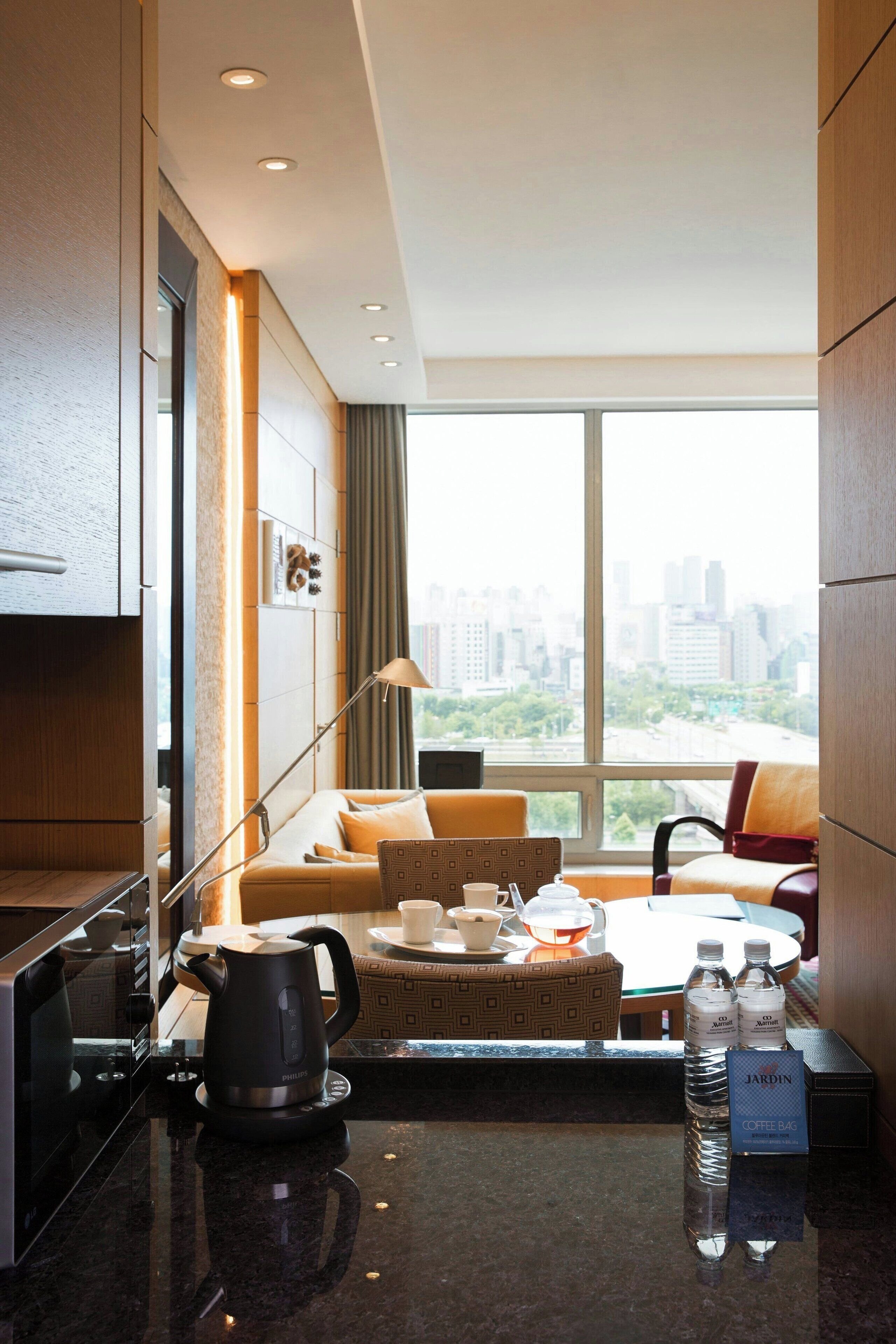 Suite, 1 habitación, vista a la ciudad | Edredón, camas con pillow-top y minibar 