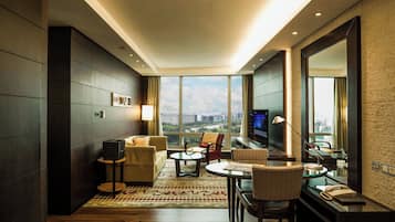 Executive Suite, 1 Bedroom, Non Smoking, City View | Living area | 42-inch LCD TV with satellite channels, TV