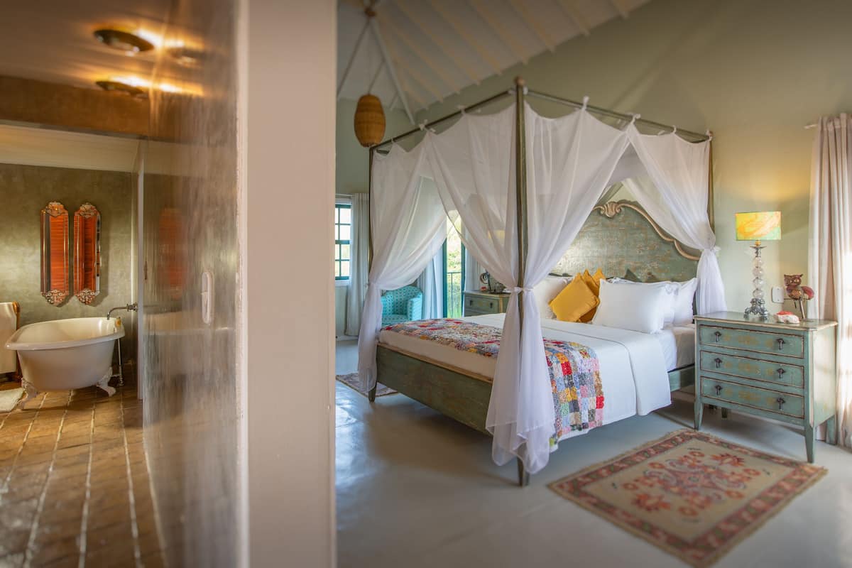 Premier Suite, 1 King Bed, Hot Tub, Mezzanine | 1 bedroom, minibar, in-room safe, individually decorated
