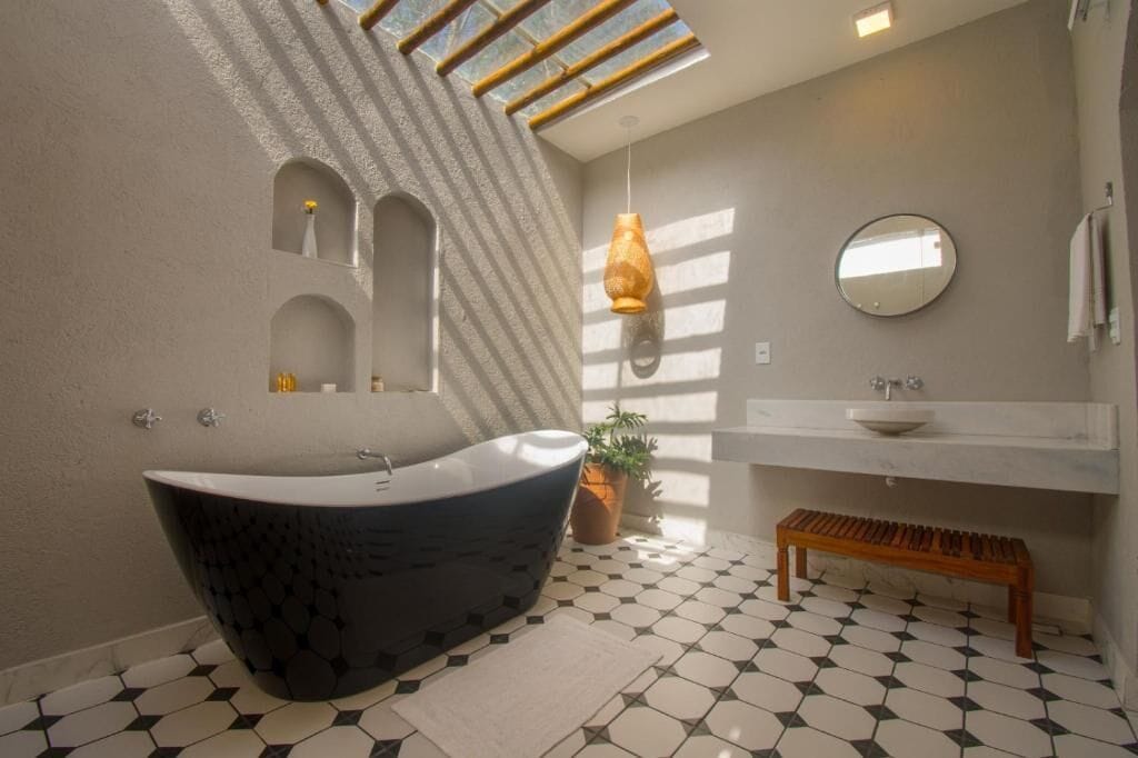 suite, bathtub, partial ocean view | bathroom | hair dryer, towels, soap, toilet paper