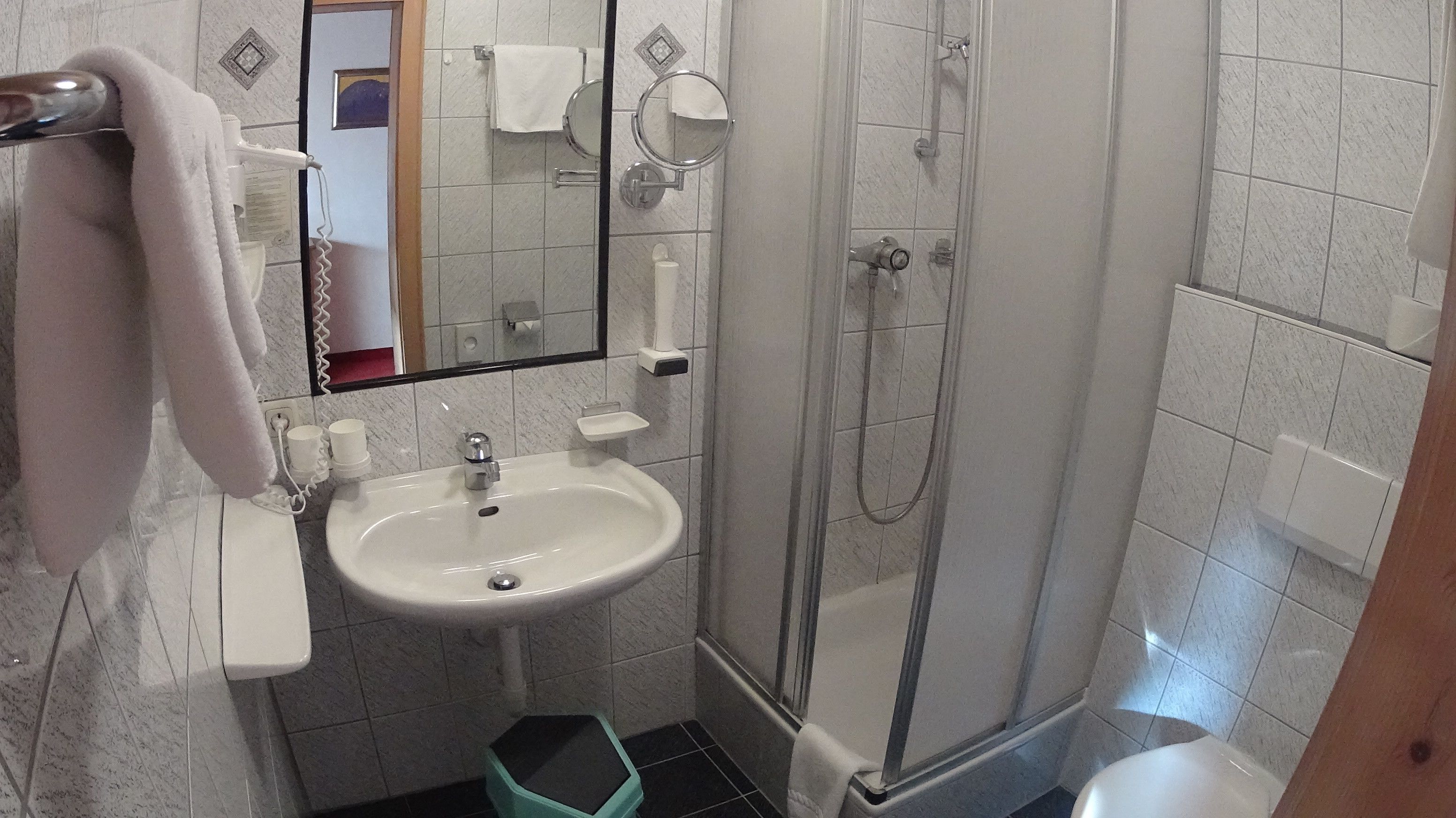 junior suite | bathroom | shower, hair dryer, towels