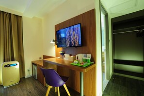 Premium bedding, minibar, blackout curtains, soundproofing