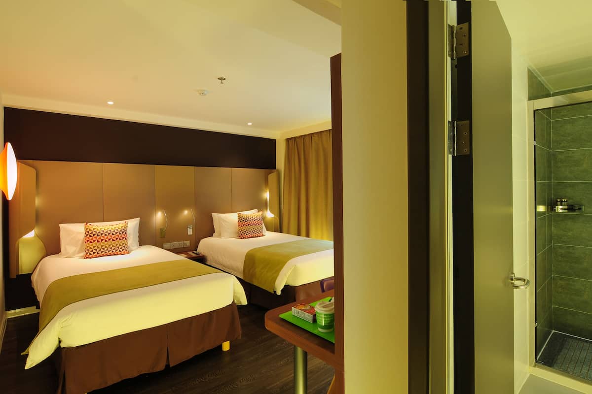 deluxe twin room | premium bedding, minibar, blackout curtains, soundproofing