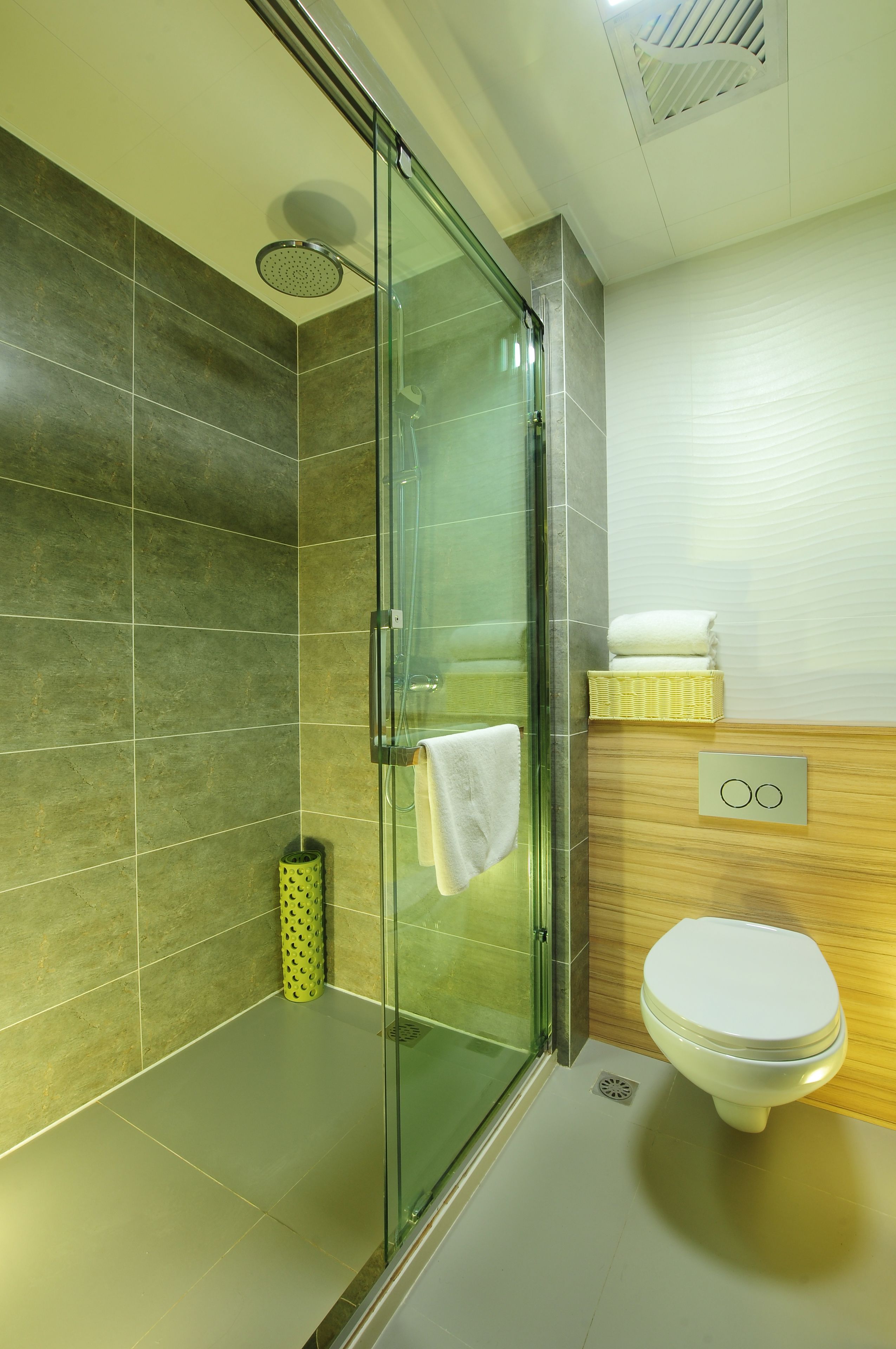 separate bathtub and shower, rainfall showerhead, slippers, towels