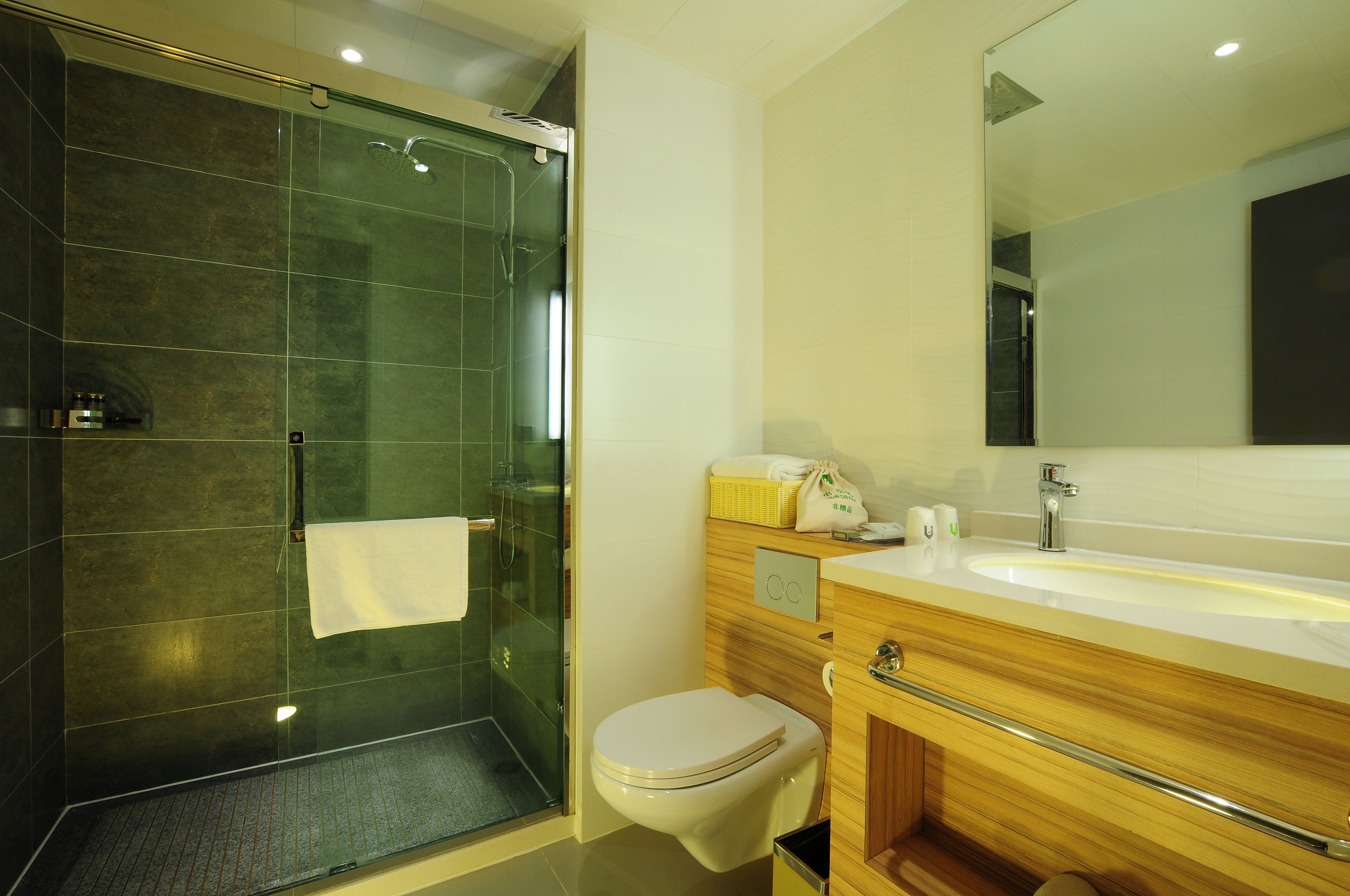 separate bathtub and shower, rainfall showerhead, slippers, towels