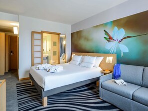 Executive kamer, 1 kingsize bed met slaapbank | Hypoallergeen beddengoed, een minibar, een kluis op de kamer, een bureau