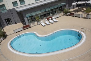 Outdoor pool, pool umbrellas, pool loungers