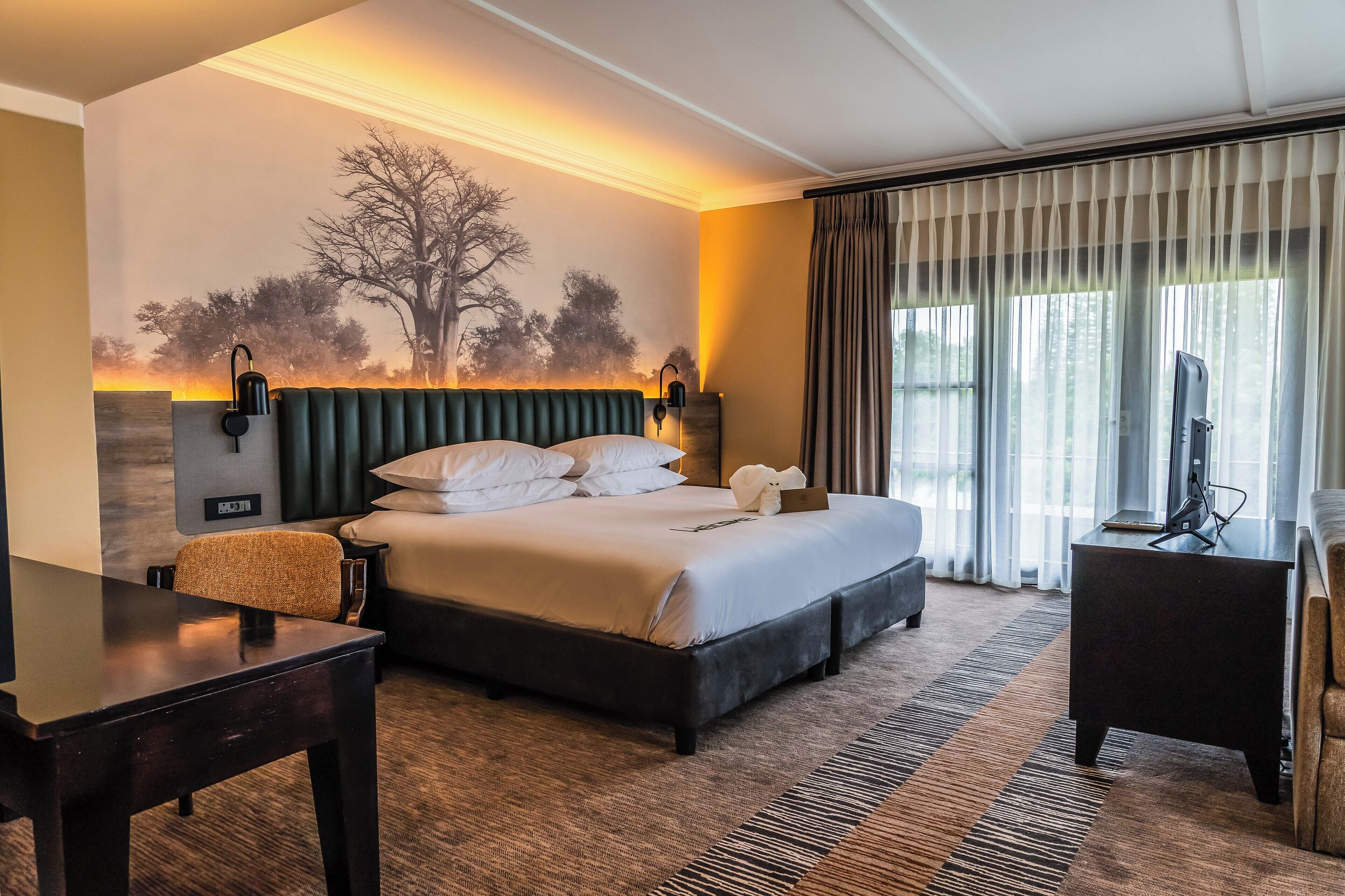 套房, 1 張特大雙人床和 1 張沙發床 | 客房內保險箱、書桌、熨斗/熨衣板、床單