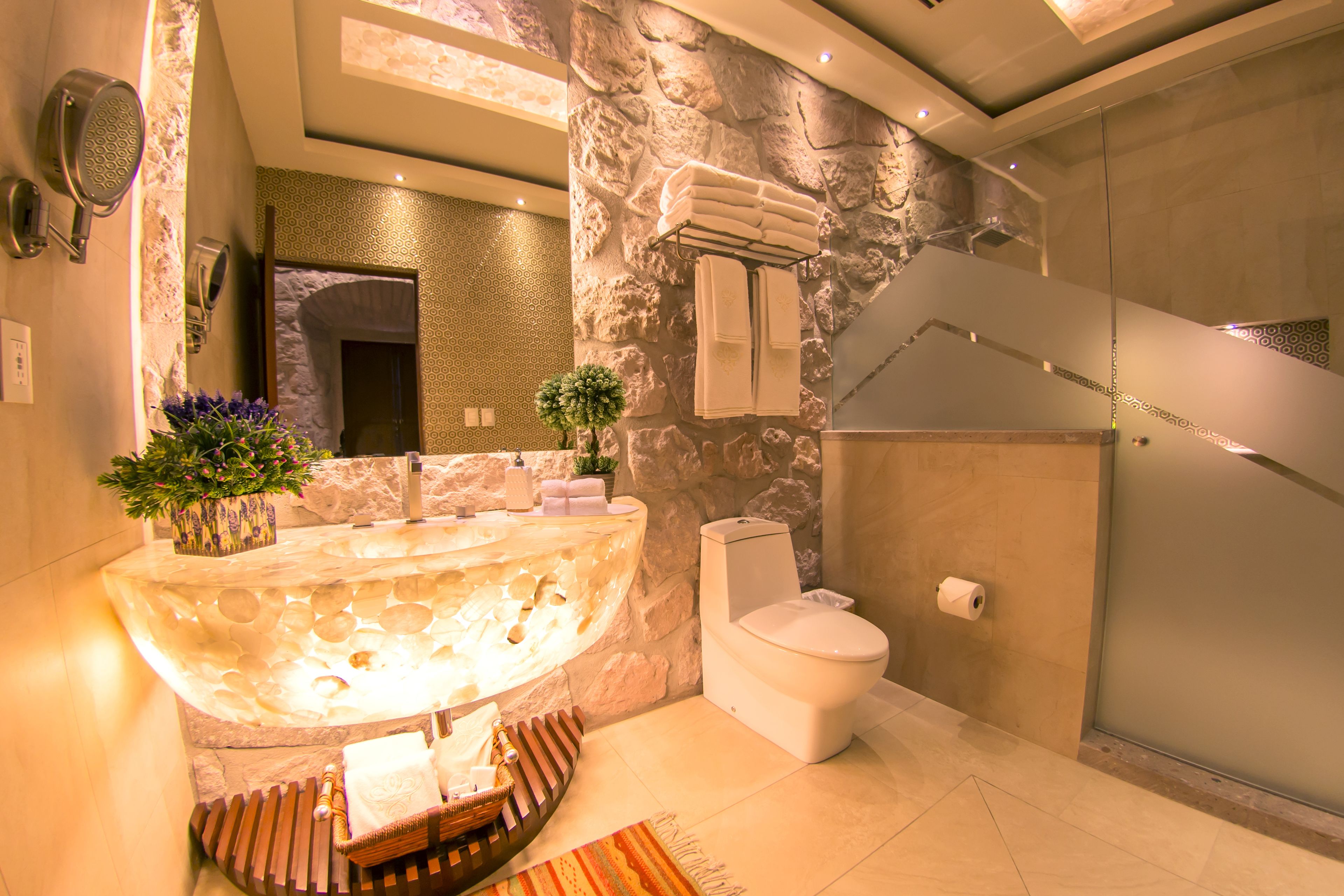 junior suite, 1 king bed | bathroom | hair dryer, slippers, towels