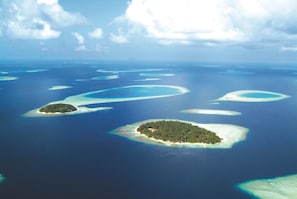 Private beach, white sand, sun loungers, beach umbrellas