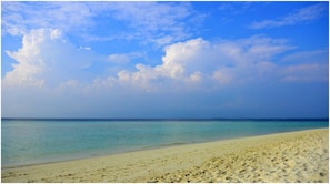 Private beach, white sand, sun loungers, beach umbrellas