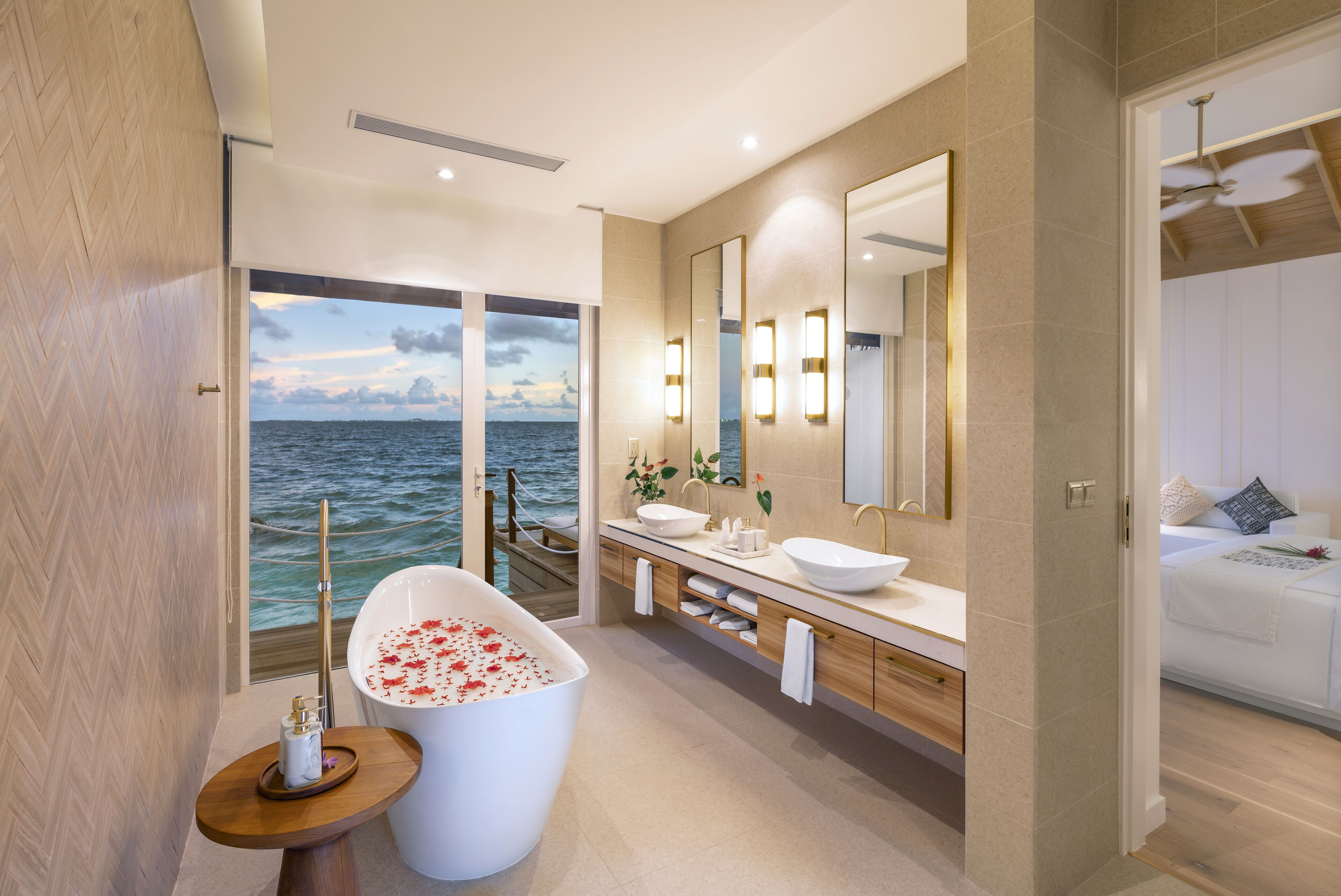 sunset water villa | bathroom | free toiletries, hair dryer, towels