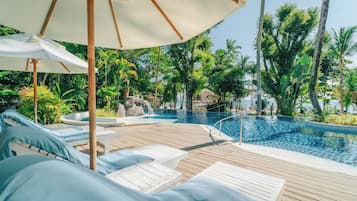 Outdoor pool, open 6:00 AM to 6:00 PM, pool umbrellas, pool loungers