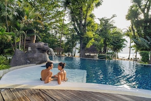 Outdoor pool, open 6:00 AM to 6:00 PM, pool umbrellas, pool loungers