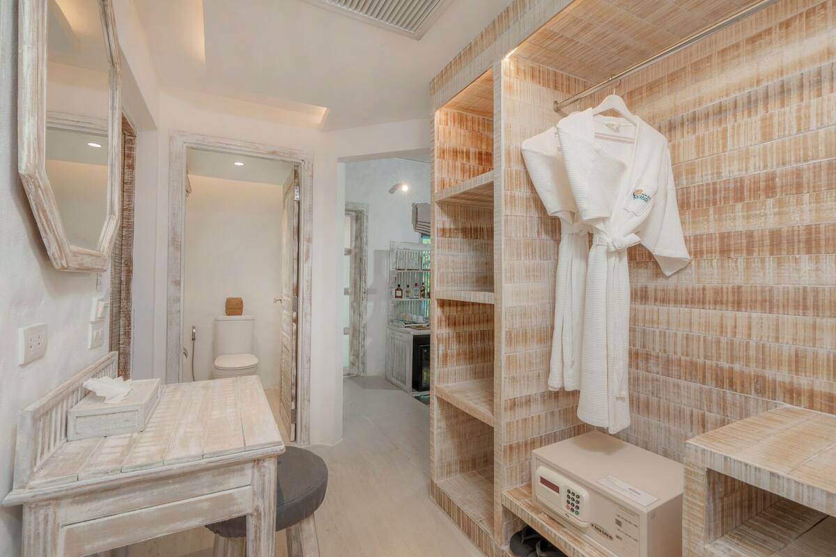 eco-friendly toiletries, hair dryer, bathrobes, slippers