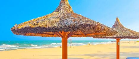 Private beach, sun loungers, beach umbrellas