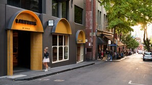 A street view with storefronts, including Laneways by Ovolo and Appllet House. - Laneways by Ovolo (Melbourne)