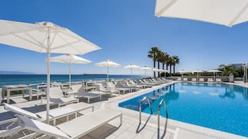 Outdoor pool, pool umbrellas, pool loungers