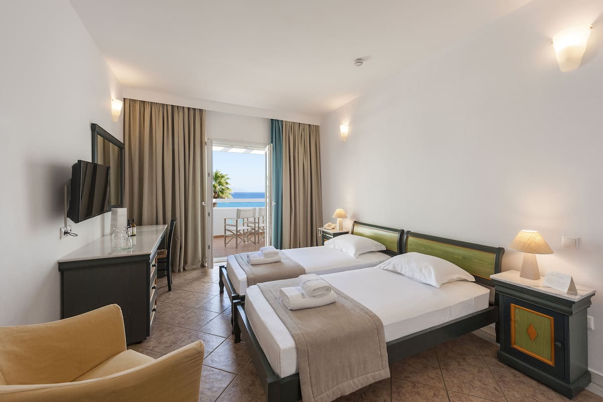 Standard Room, Sea View | 1 bedroom, in-room safe, desk, laptop workspace