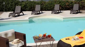 Outdoor pool, sun loungers