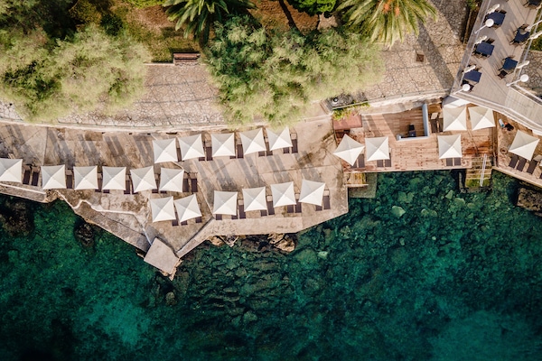 White sand, sun loungers, beach umbrellas, beach towels