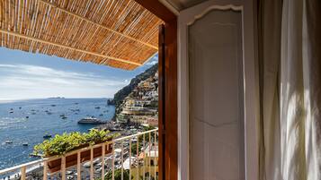 Classic Double Room, Sea View | Minibar, in-room safe, individually decorated, individually furnished